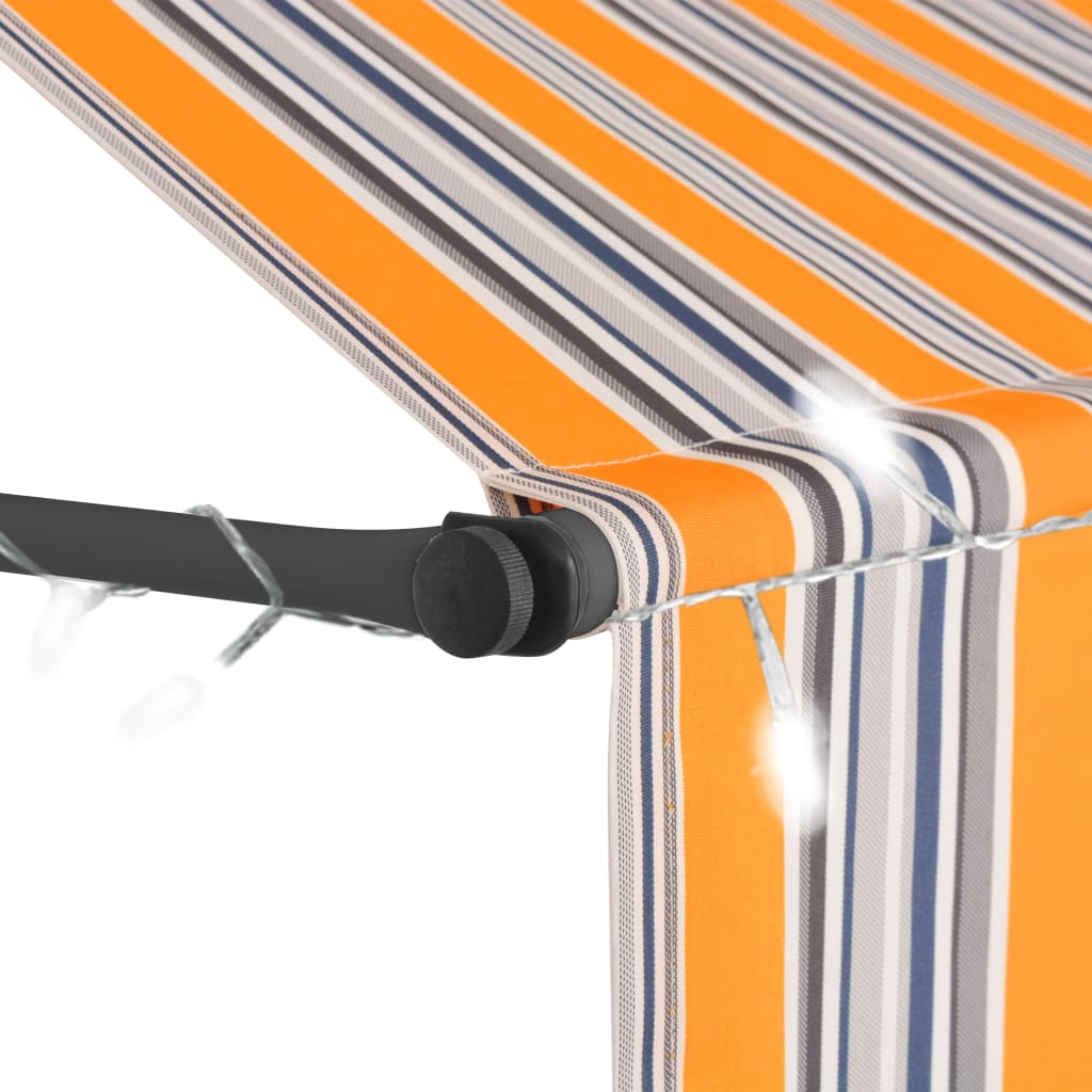 Manual retractable awning with LED 300 cm yellow and blue